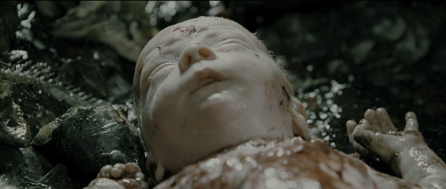 Wide shot frame from Perfume: The Story of a Murderer — water, person, human face