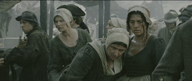 Wide shot frame from Perfume: The Story of a Murderer — standing, person, human face