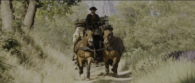 Wide shot frame from Perfume: The Story of a Murderer — sitting, walking, street