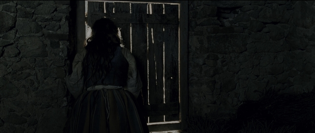 Wide shot frame from Perfume: The Story of a Murderer — standing, door, dress