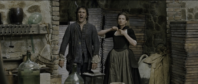 Wide shot frame from Perfume: The Story of a Murderer — standing, room, door