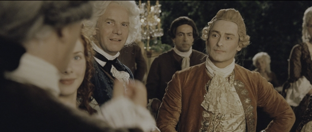 Wide shot frame from Perfume: The Story of a Murderer — standing, room, dialogue