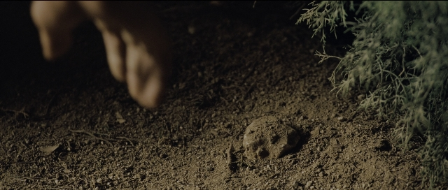 Wide shot frame from Perfume: The Story of a Murderer — hand, person