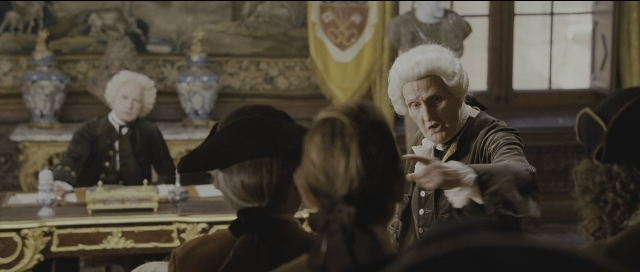 Wide shot frame from Perfume: The Story of a Murderer — sitting, room, table