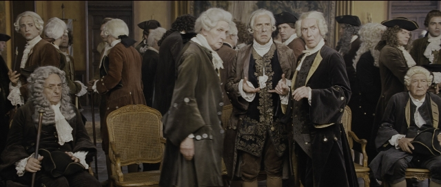 Wide shot frame from Perfume: The Story of a Murderer — sitting, book, standing