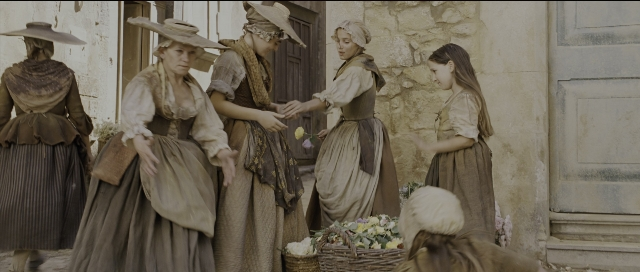 Wide shot frame from Perfume: The Story of a Murderer — standing, dialogue, door