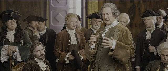 Wide shot frame from Perfume: The Story of a Murderer — sitting, standing, dialogue