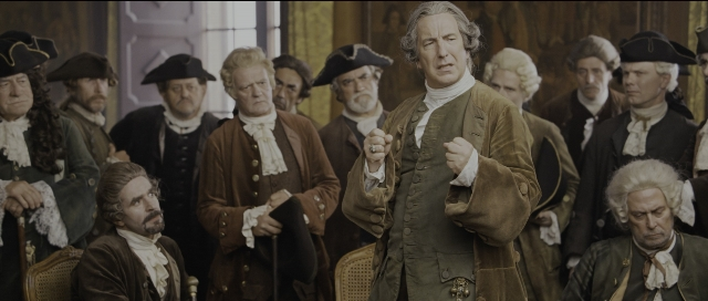 Wide shot frame from Perfume: The Story of a Murderer — standing, room, coat