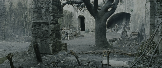 Wide shot frame from Perfume: The Story of a Murderer — sitting, standing, walking