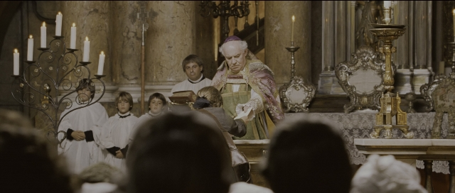 Wide shot frame from Perfume: The Story of a Murderer — book, standing, person