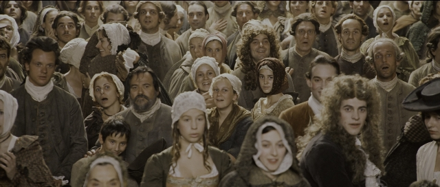 Wide shot frame from Perfume: The Story of a Murderer — standing, room, person