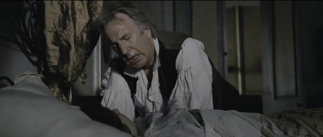 Wide shot frame from Perfume: The Story of a Murderer — sitting, bed, shirt