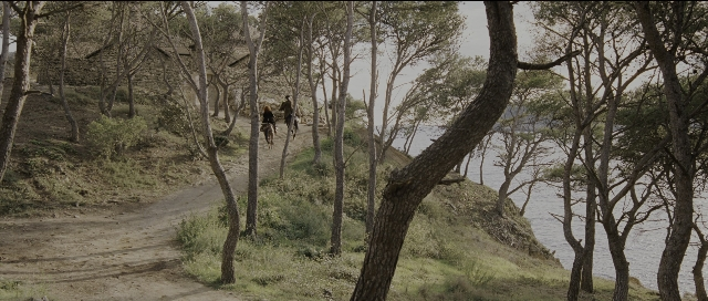 Wide shot frame from Perfume: The Story of a Murderer — walking, water, person