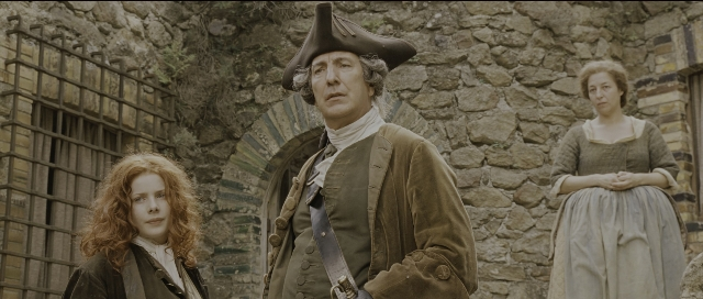 Wide shot frame from Perfume: The Story of a Murderer — standing, hat, coat