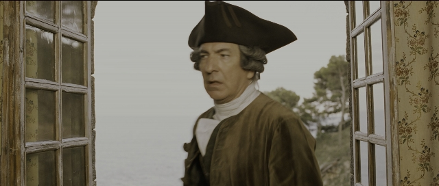 Wide shot frame from Perfume: The Story of a Murderer — standing, hat, coat