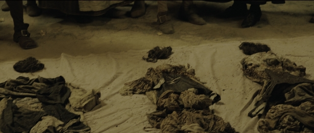 Wide shot frame from Perfume: The Story of a Murderer — standing, person, footwear