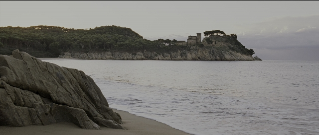 Wide shot frame from Perfume: The Story of a Murderer — water, castle