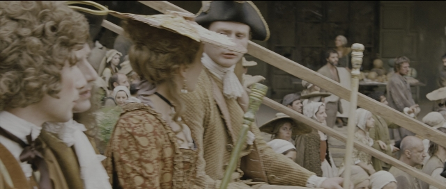 Wide shot frame from Perfume: The Story of a Murderer — standing, room, dialogue