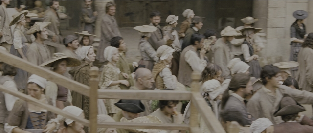 Wide shot frame from Perfume: The Story of a Murderer — standing, person, human face
