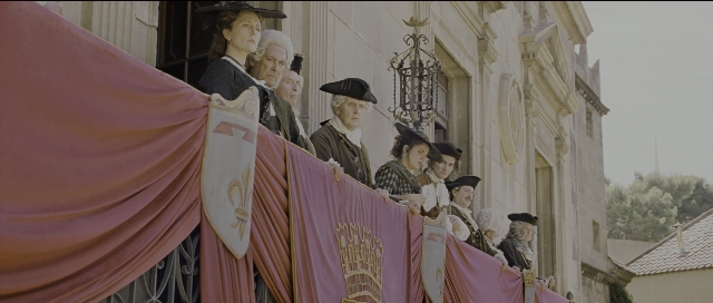 Wide shot frame from Perfume: The Story of a Murderer — standing, person, human face