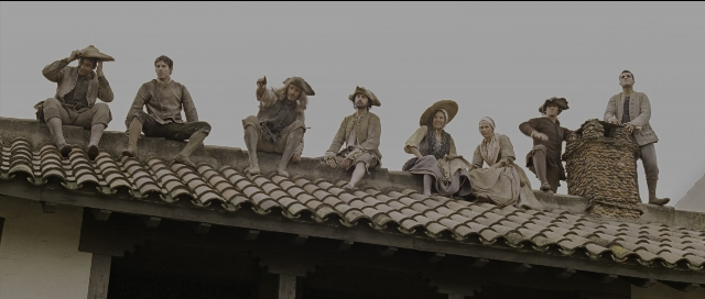 Wide shot frame from Perfume: The Story of a Murderer — sitting, bird, person
