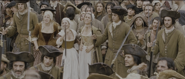 Wide shot frame from Perfume: The Story of a Murderer — standing, person, human face