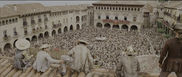 Wide shot frame from Perfume: The Story of a Murderer — sitting, standing, person