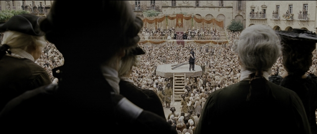 Wide shot frame from Perfume: The Story of a Murderer — standing, dialogue, suit