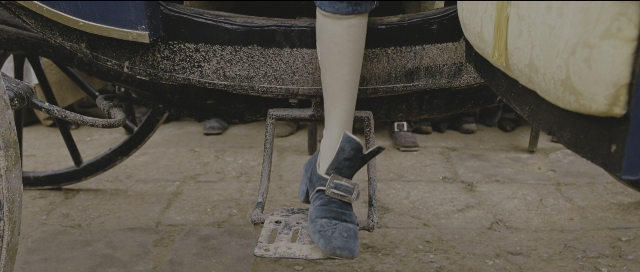 Wide shot frame from Perfume: The Story of a Murderer — standing, horse, train
