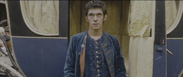 Wide shot frame from Perfume: The Story of a Murderer — standing, jacket, hair