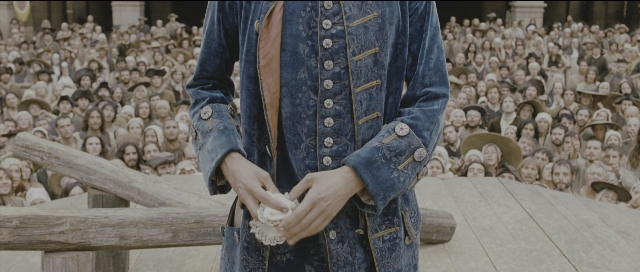 Wide shot frame from Perfume: The Story of a Murderer — standing, person, human face