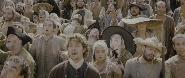 Wide shot frame from Perfume: The Story of a Murderer — standing, person, human face
