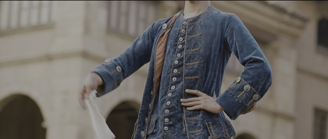 Wide shot frame from Perfume: The Story of a Murderer — standing, hand, person