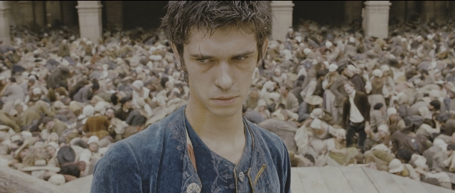 Medium shot frame from Perfume: The Story of a Murderer — standing, face, hair
