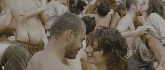 Wide shot frame from Perfume: The Story of a Murderer — room, kiss, hair