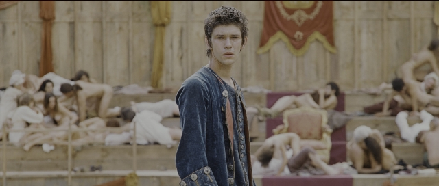 Wide shot frame from Perfume: The Story of a Murderer — sitting, standing, room