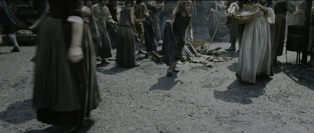 Wide shot frame from Perfume: The Story of a Murderer — standing, walking, street