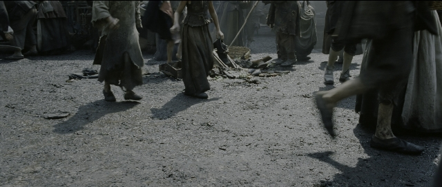 Wide shot frame from Perfume: The Story of a Murderer — walking, street, person