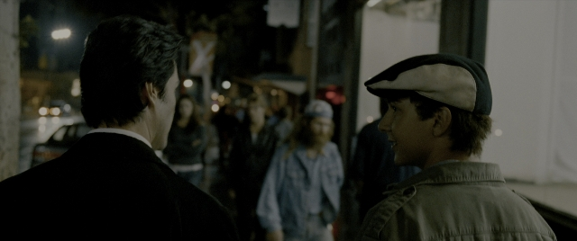 Wide shot frame from Constantine — standing, walking, street