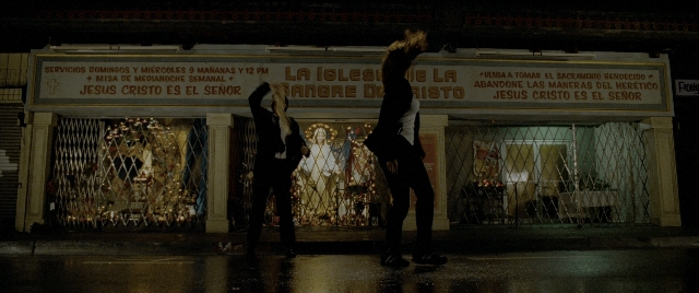 Wide shot frame from Constantine — standing, street, night