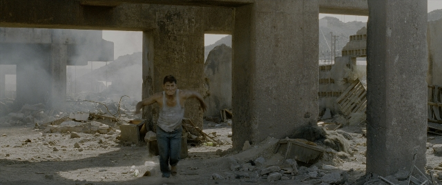 Wide shot frame from Constantine — face, smoke, person