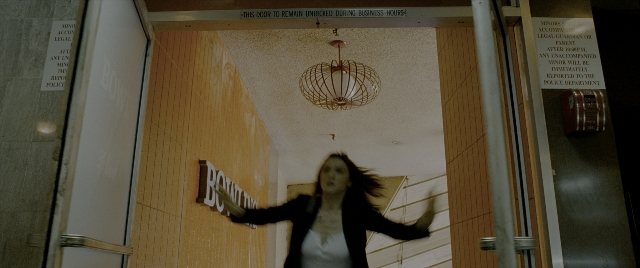 Wide shot frame from Constantine — standing, face, hair