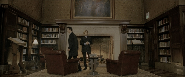 Wide shot frame from Constantine — book, room, table