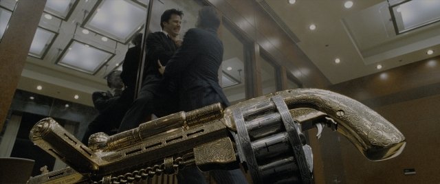 Wide shot frame from Constantine — standing, gun, person