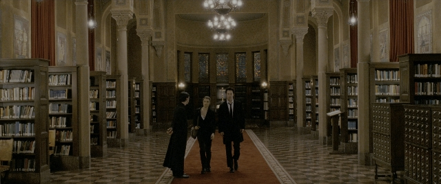 Wide shot frame from Constantine — book, walking, room