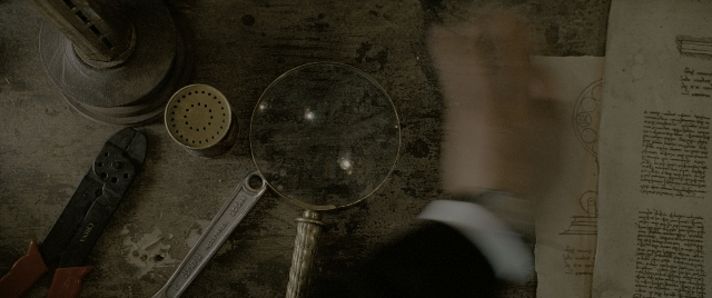 Wide shot frame from Constantine — book, standing, table