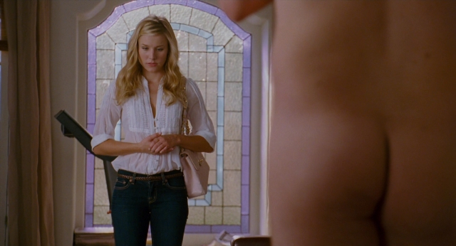 Wide shot frame from Forgetting Sarah Marshall — standing, table, shirt
