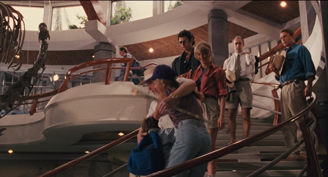 Wide shot frame from Jurassic Park — standing, dialogue, shirt