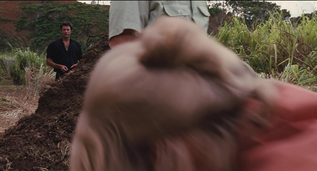 Wide shot frame from Jurassic Park — standing, bed, shirt