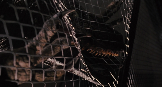 Wide shot frame from Jurassic Park — room, animal, bird